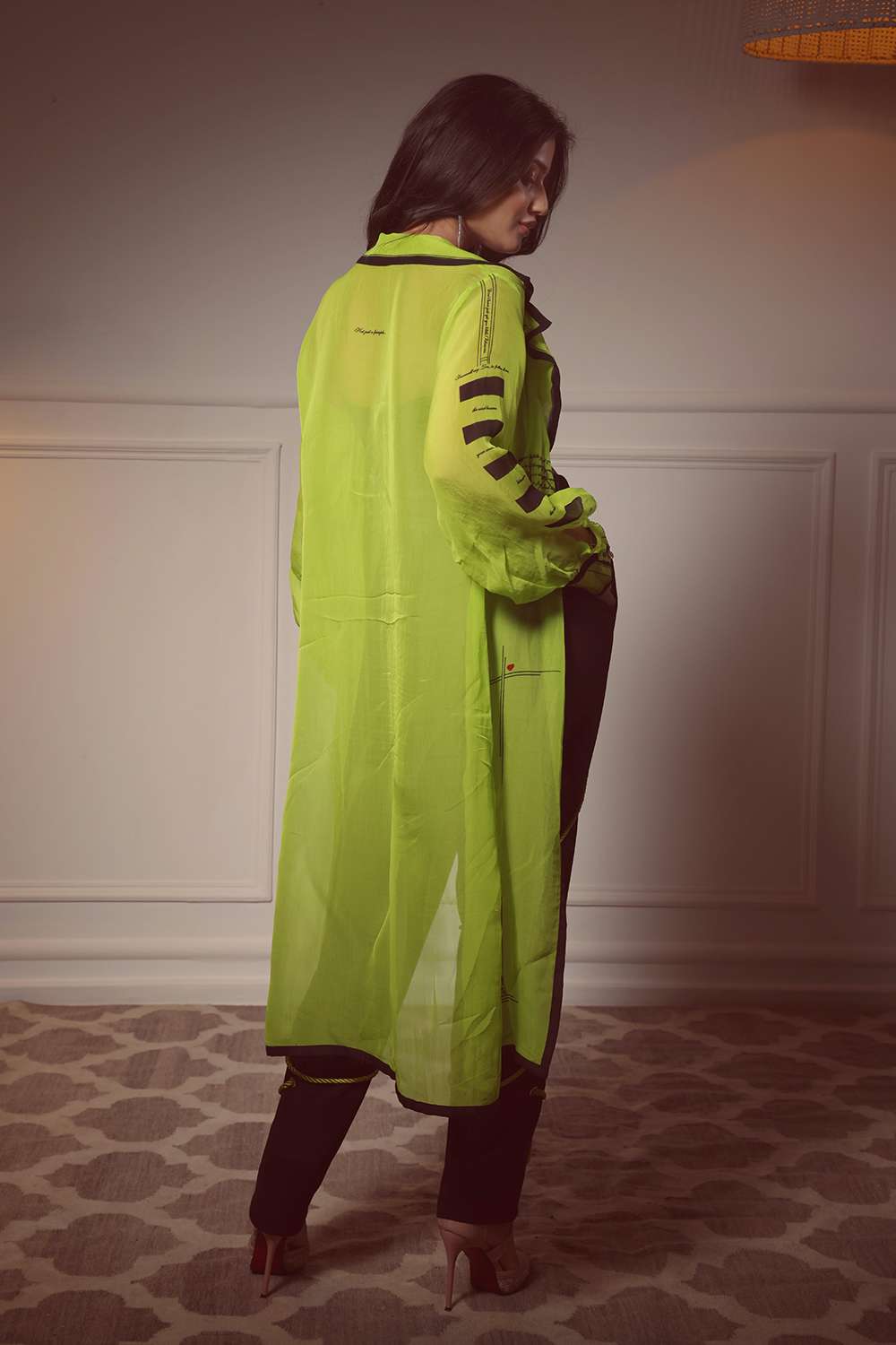 Cover-up jacket with text detail, corset, & wrapped rope pant