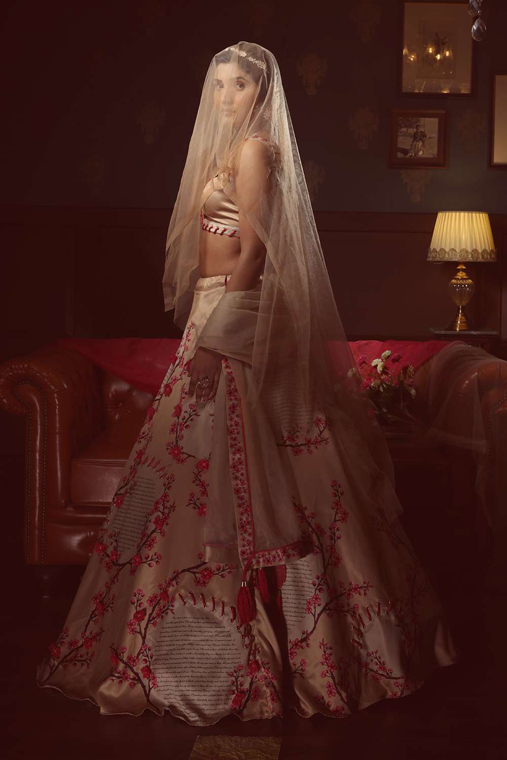 Printed lehenga with 3D flowers & rope detail, eyelet blouse, and an open dupatta